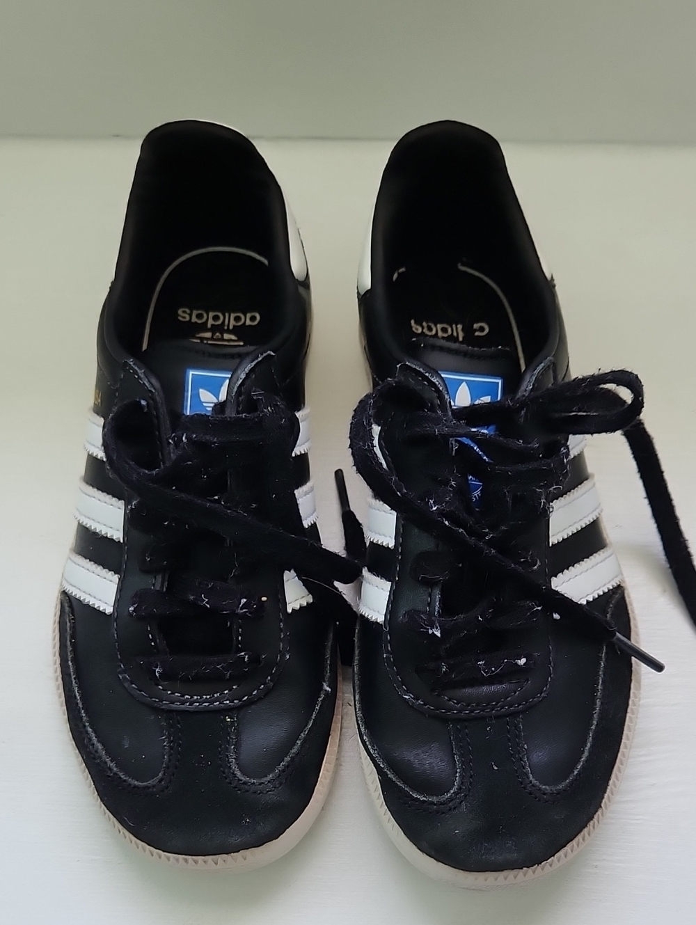 adidas Black and White Three-Stripe Low-Top Sneakers